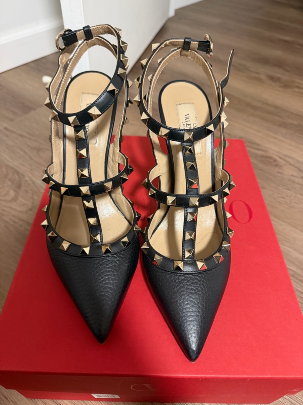 Valentino Garavani Black Leather Rockstud T-Strap Pumps with Gold Studs